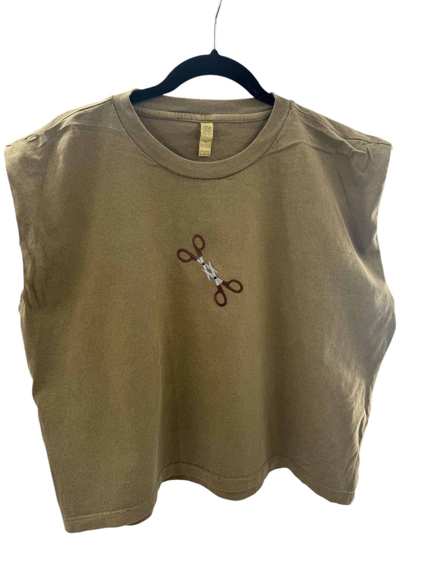 a t - shirt with a pair of scissors on it