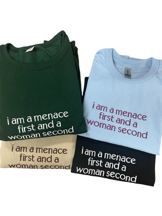 three t - shirts that say i am a menage first and a woman second