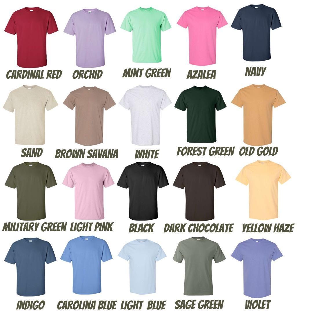 a bunch of different colors of t - shirts