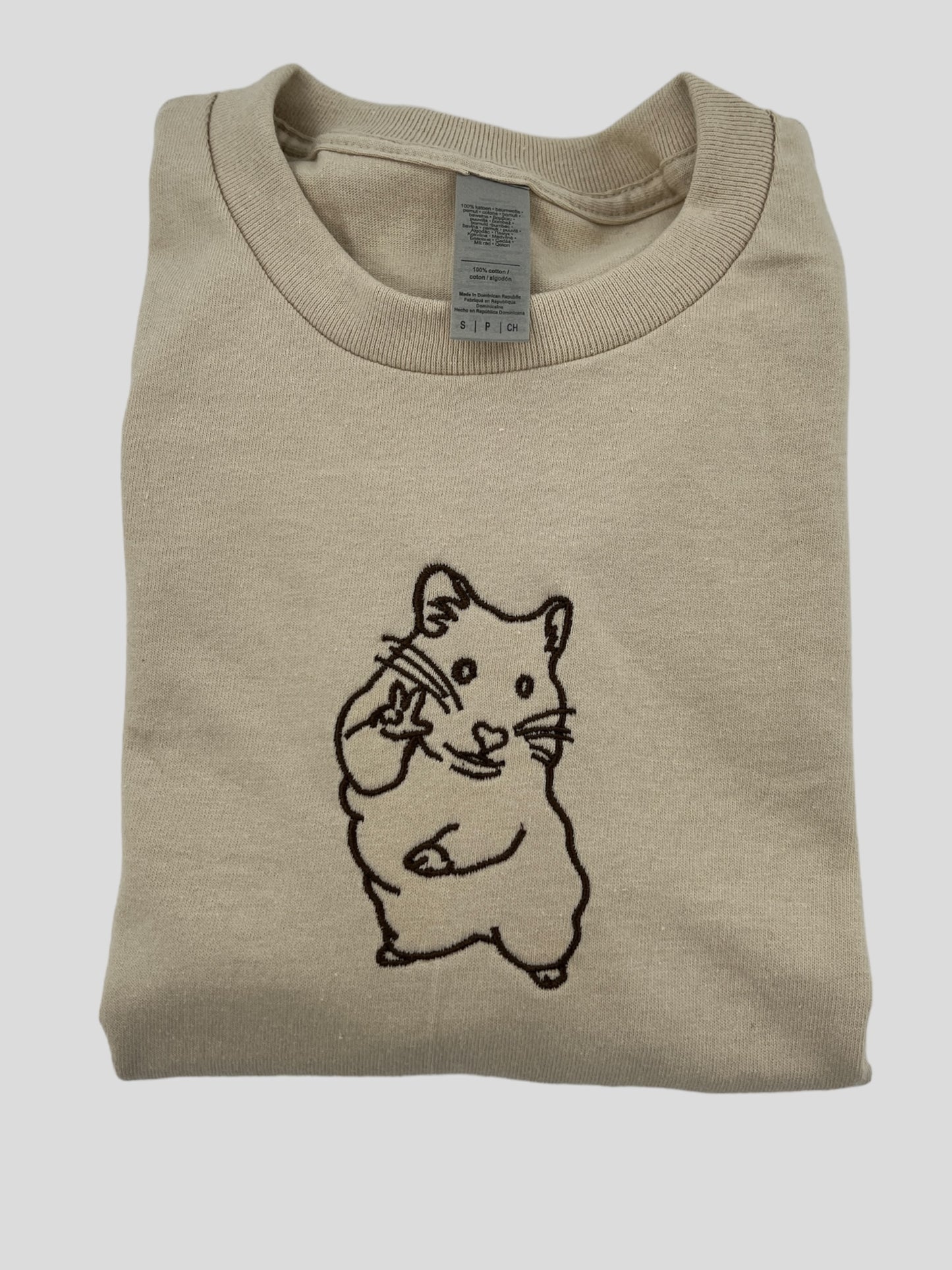 a t - shirt with a picture of a mouse on it