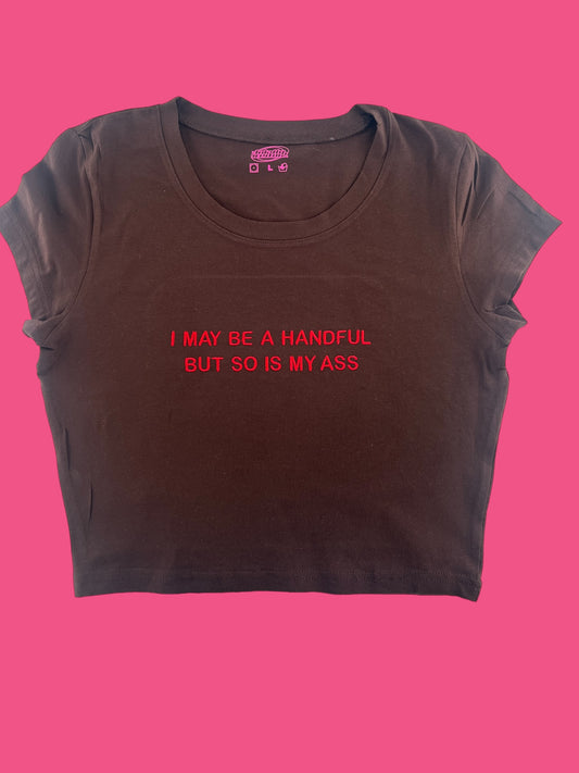 a t - shirt that says i may be a handful but so is my ass