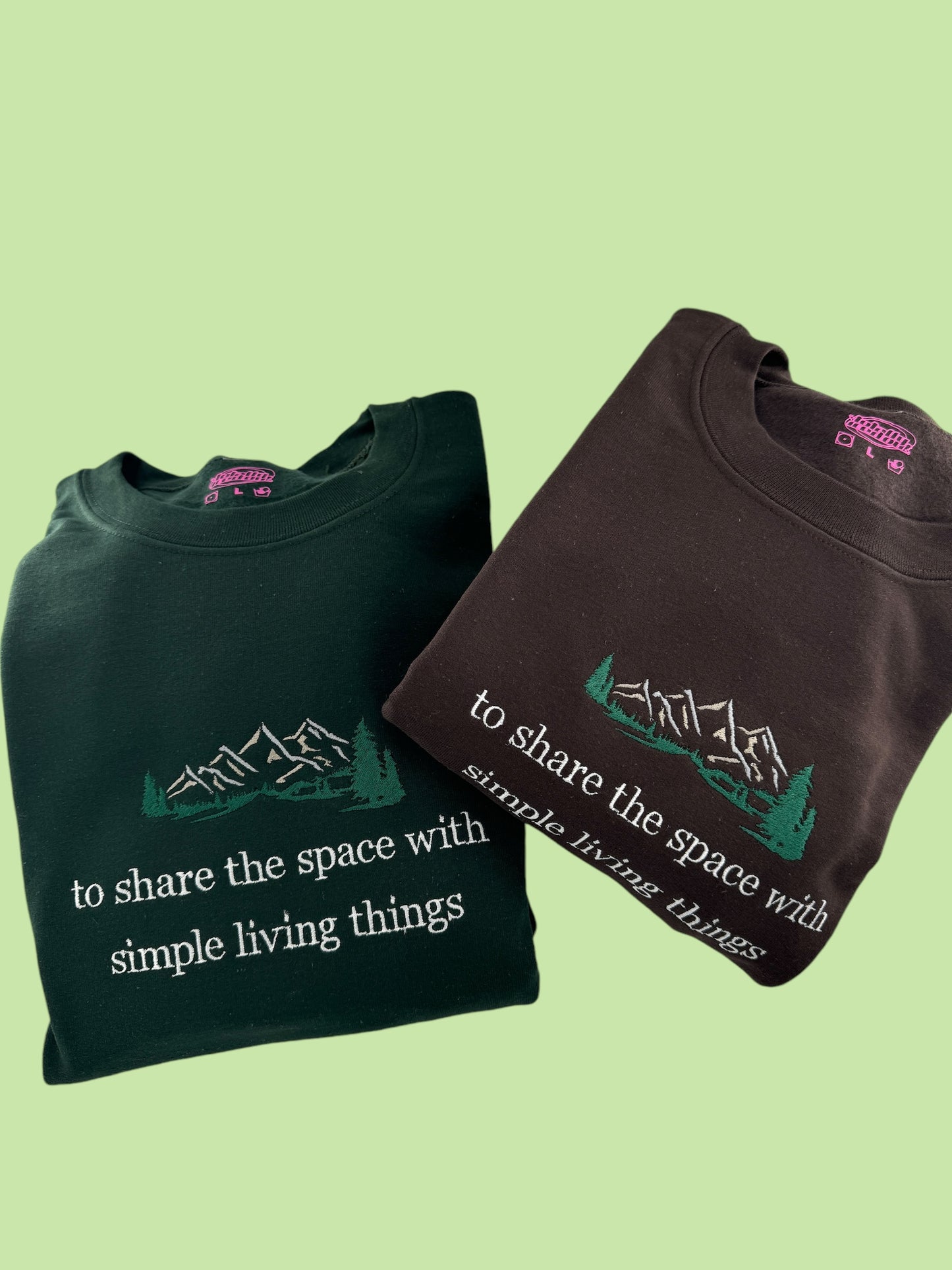 two t - shirts that say to share the space with simple living things