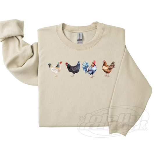 a sweater with a picture of chickens on it