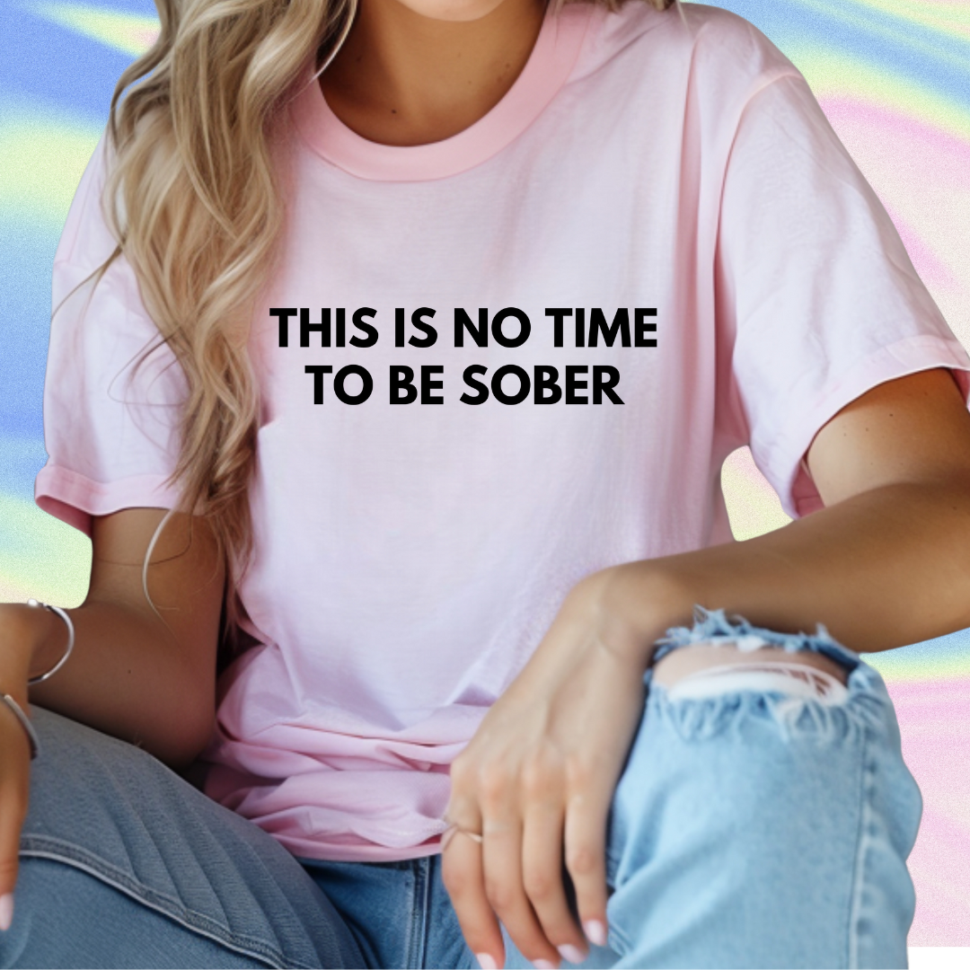 a woman wearing a pink t - shirt that says, this is no time to