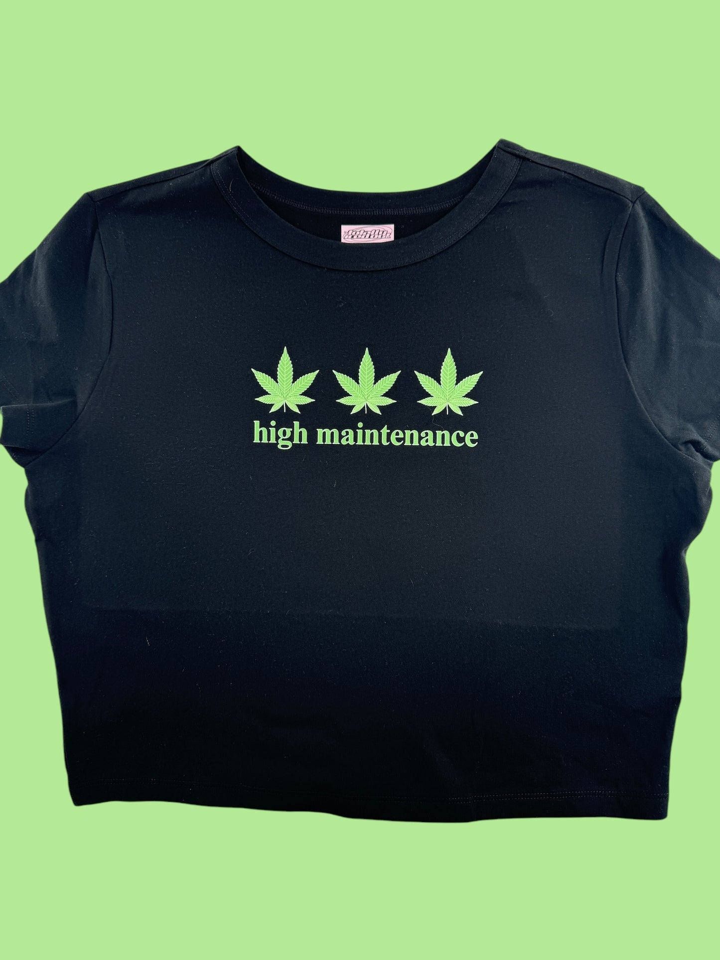 a t - shirt that says high maintenance on it