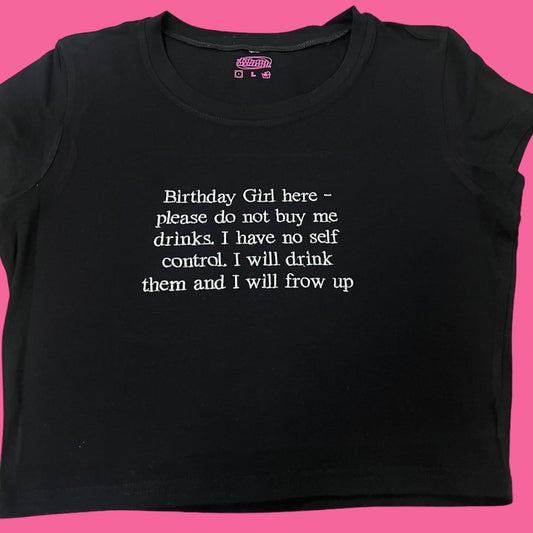 a black t - shirt with the words birthday girl here please do not buy me