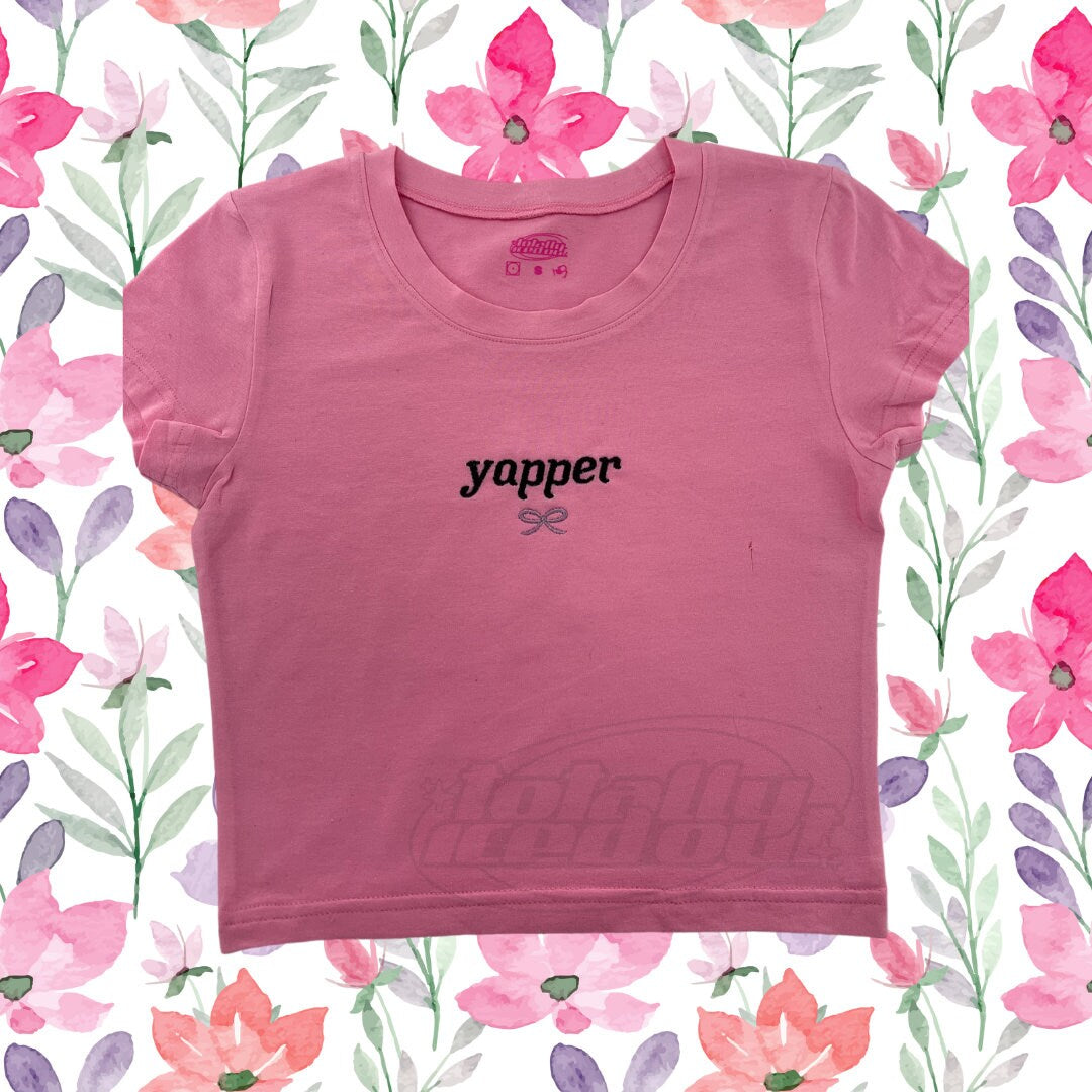 a pink t - shirt with the word yoper printed on it
