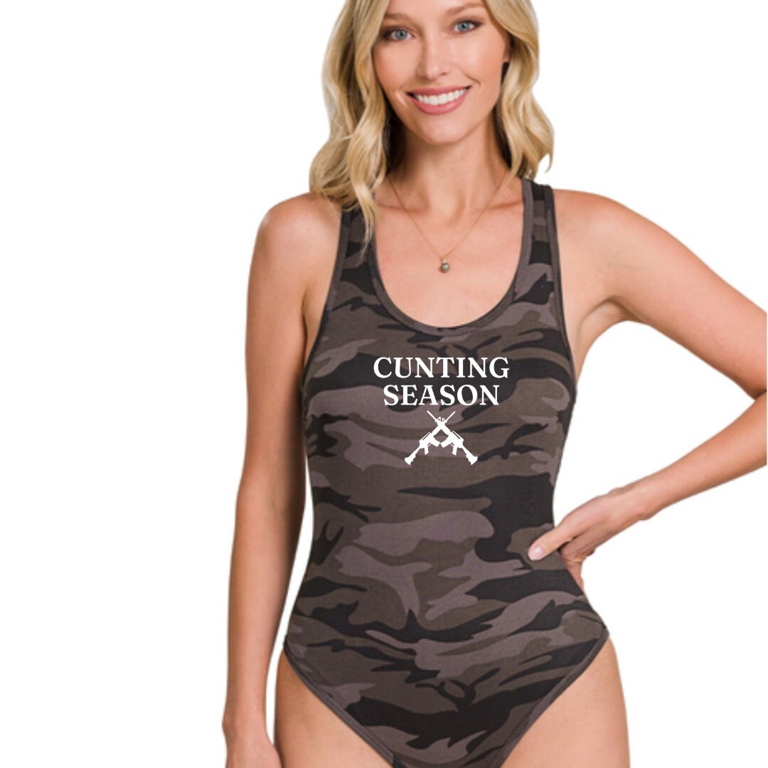 a woman wearing a bathing suit with a hunting season on it