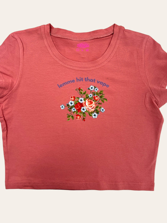 a t - shirt with flowers on the chest
