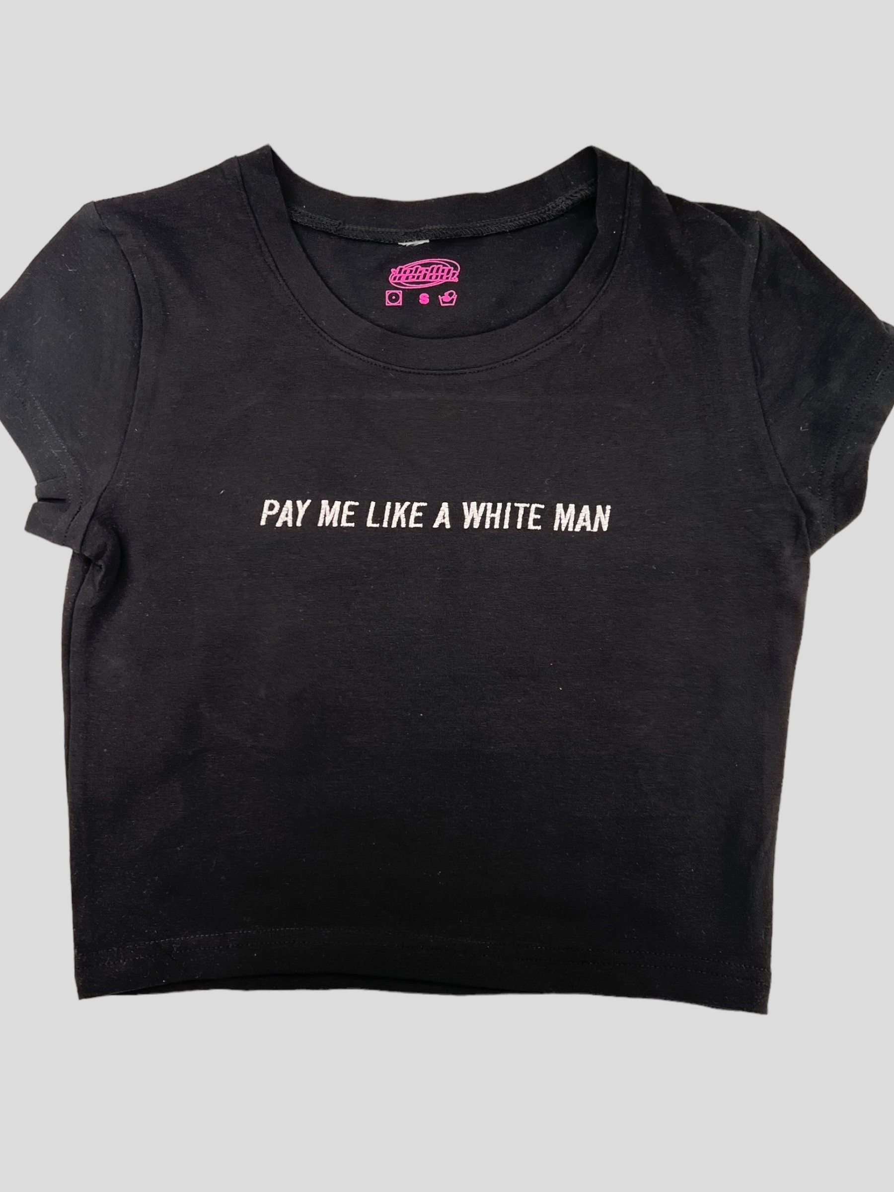 a black t - shirt that says pay me like a white man