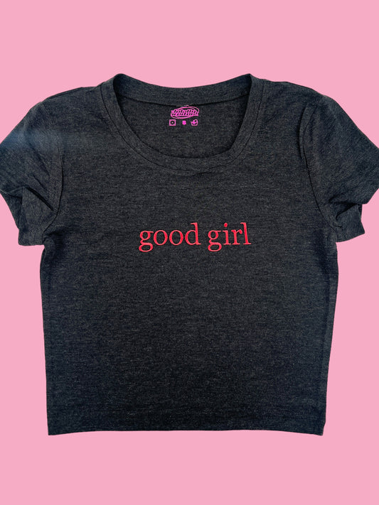 a t - shirt that says good girl on it