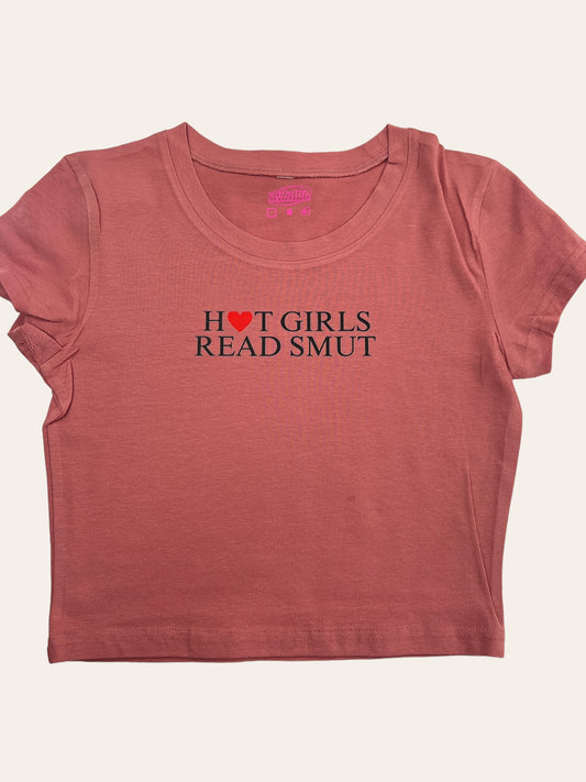 a red shirt that says hot girls read smut
