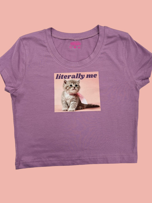 a women&#39;s purple t - shirt with a picture of a cat on it
