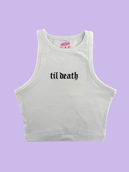 a white crop top with the word til death printed on it