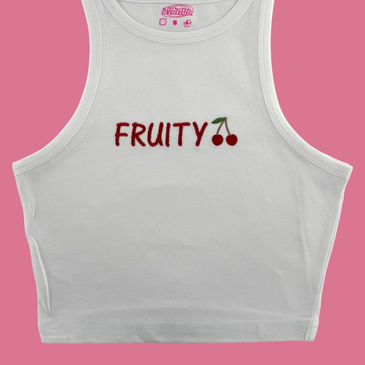 a white crop top with fruity written on it