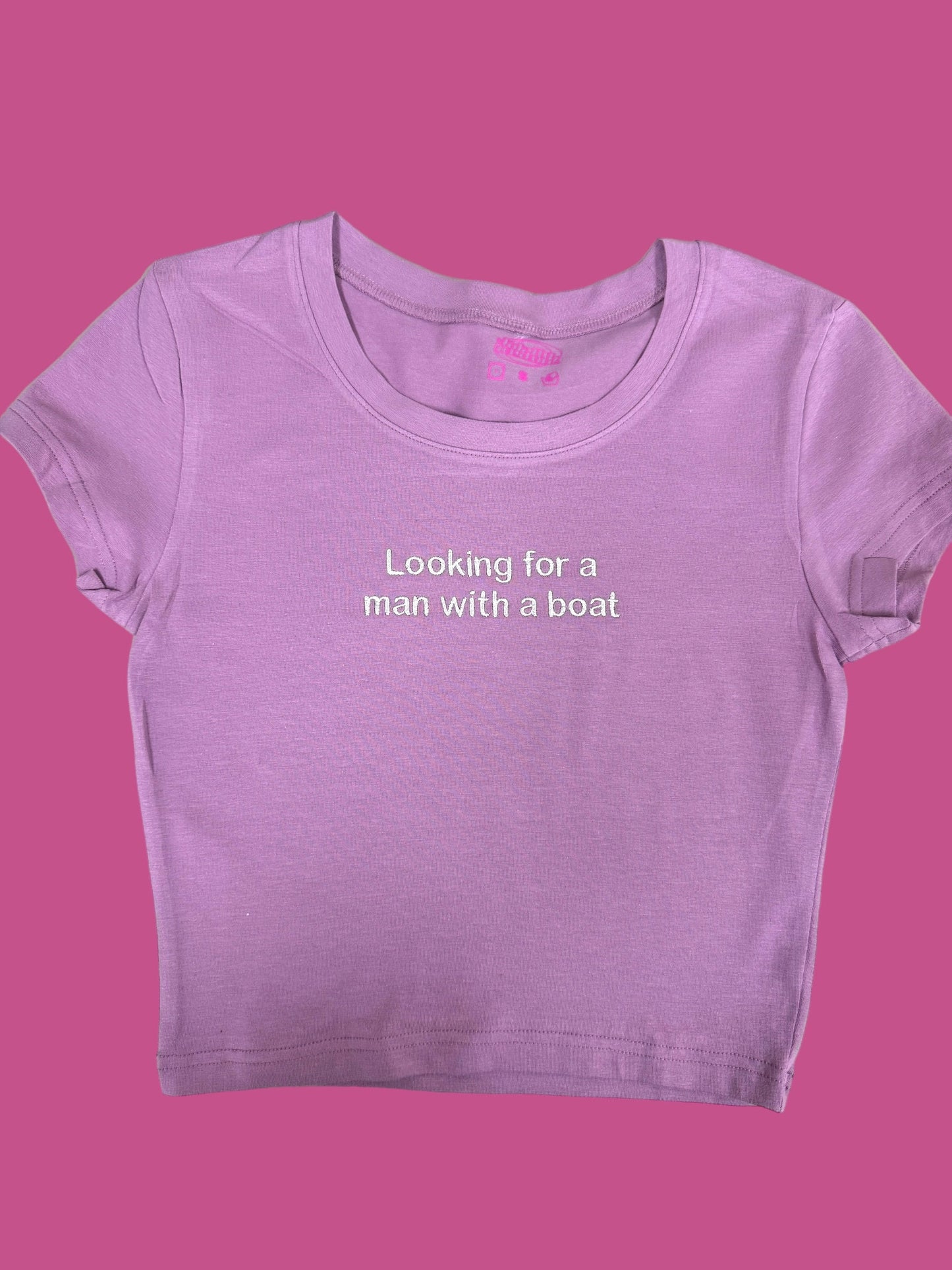 a t - shirt that says looking for a man with a boat on it