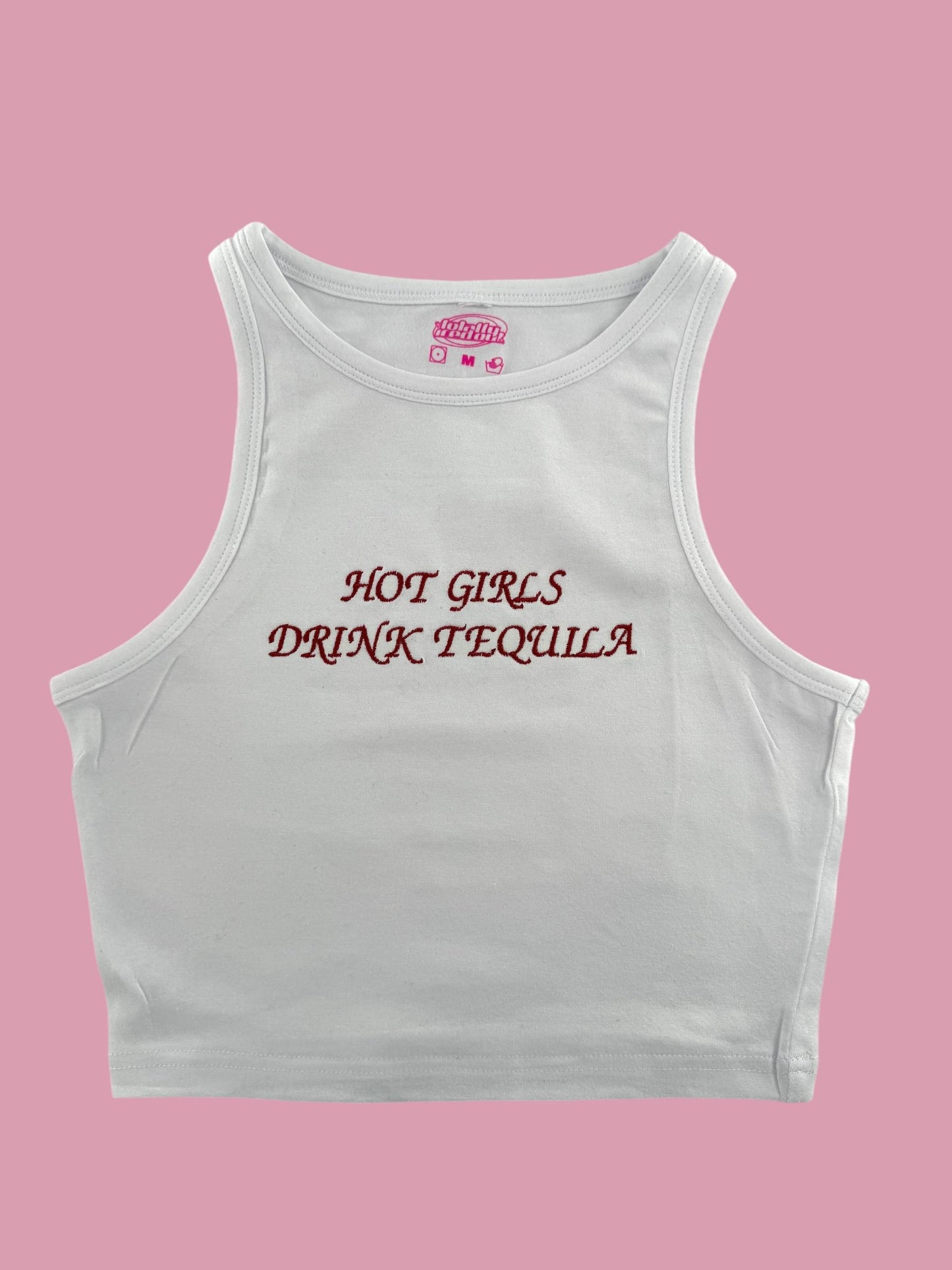 a white crop top that says hot girls drink tequila