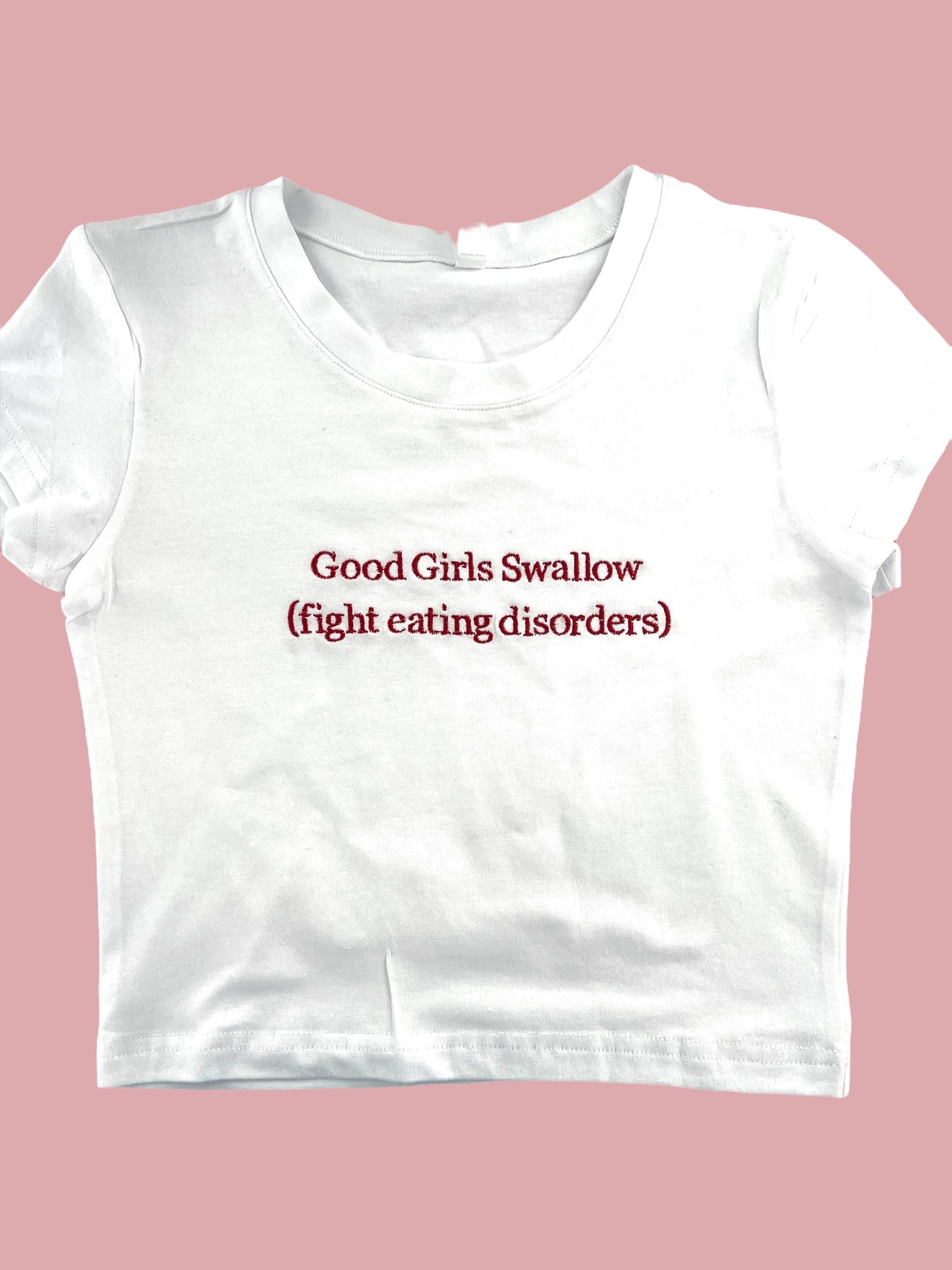 a white t - shirt that says, good girls allow fight eating disorders