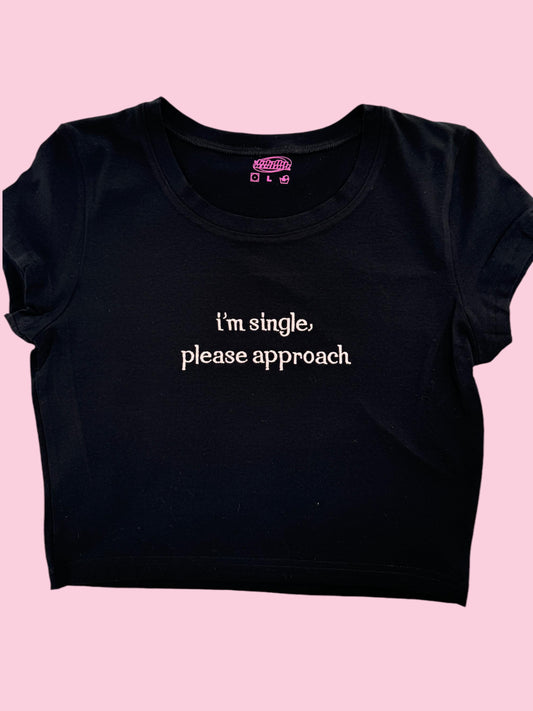 a black t - shirt that says i&#39;m single please approach