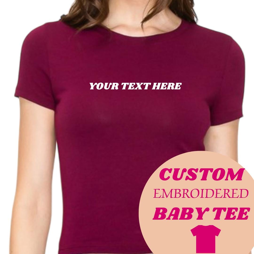 a women&#39;s t - shirt with the text custom embroidered on it