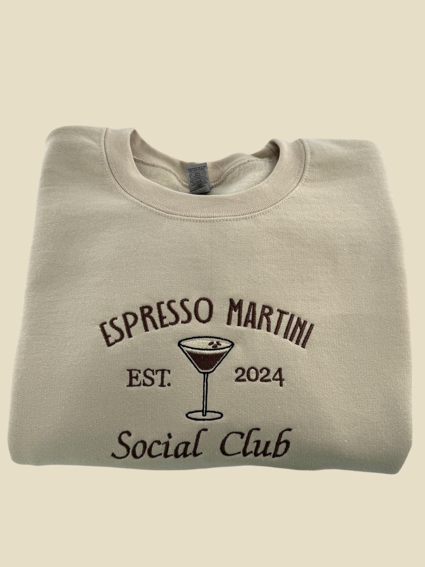 a white shirt with a martini glass on it