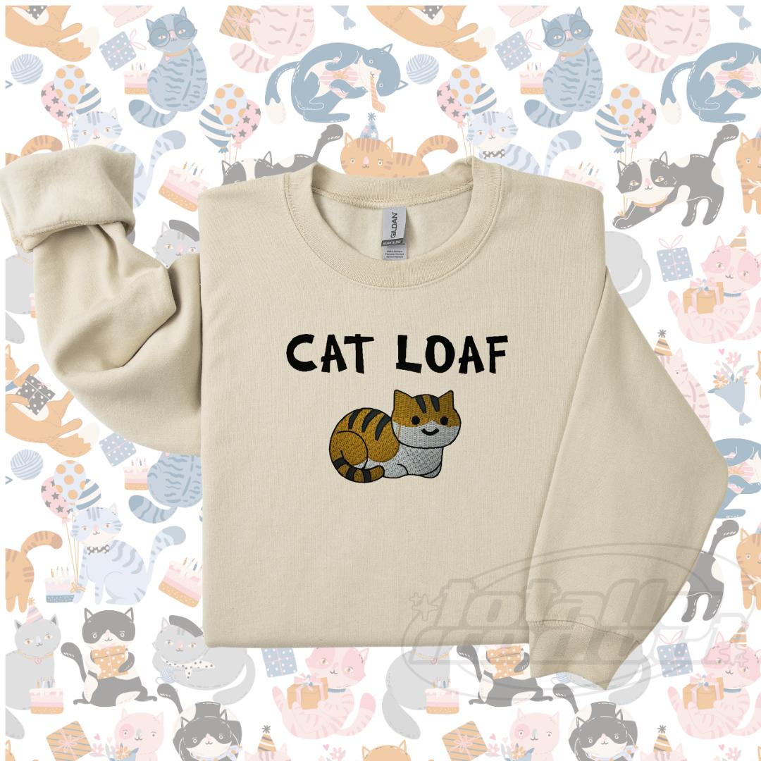 a cat sweatshirt with the words cat loaf on it