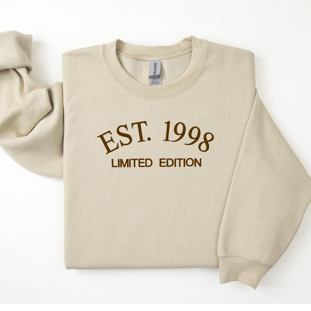 a long sleeved shirt with the words est 1989 printed on it