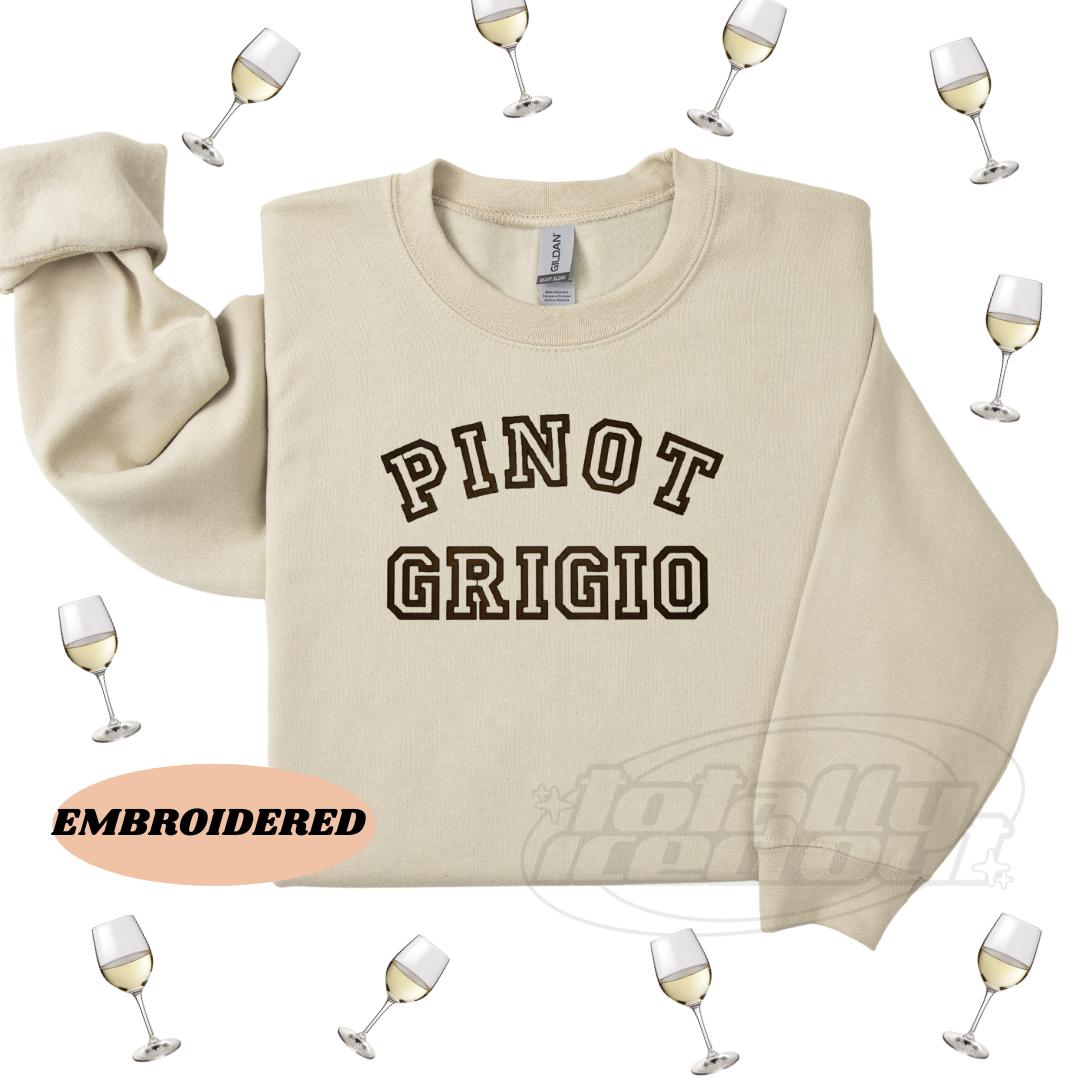 a sweater with the words pinot grigio printed on it