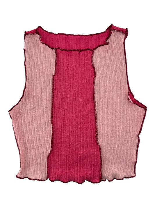 a pink and pink top with pleated sides