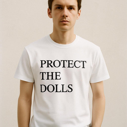 a man wearing a white t - shirt that says protect the dolls
