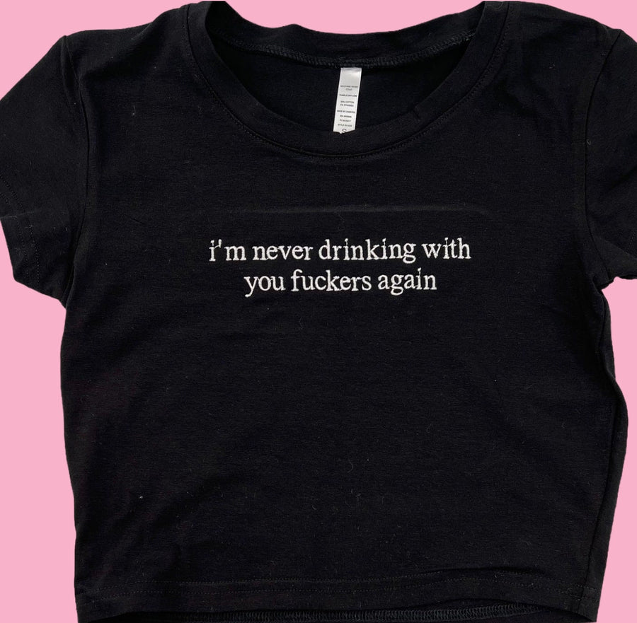 a black t - shirt with the words, i&#39;m never drinking with you