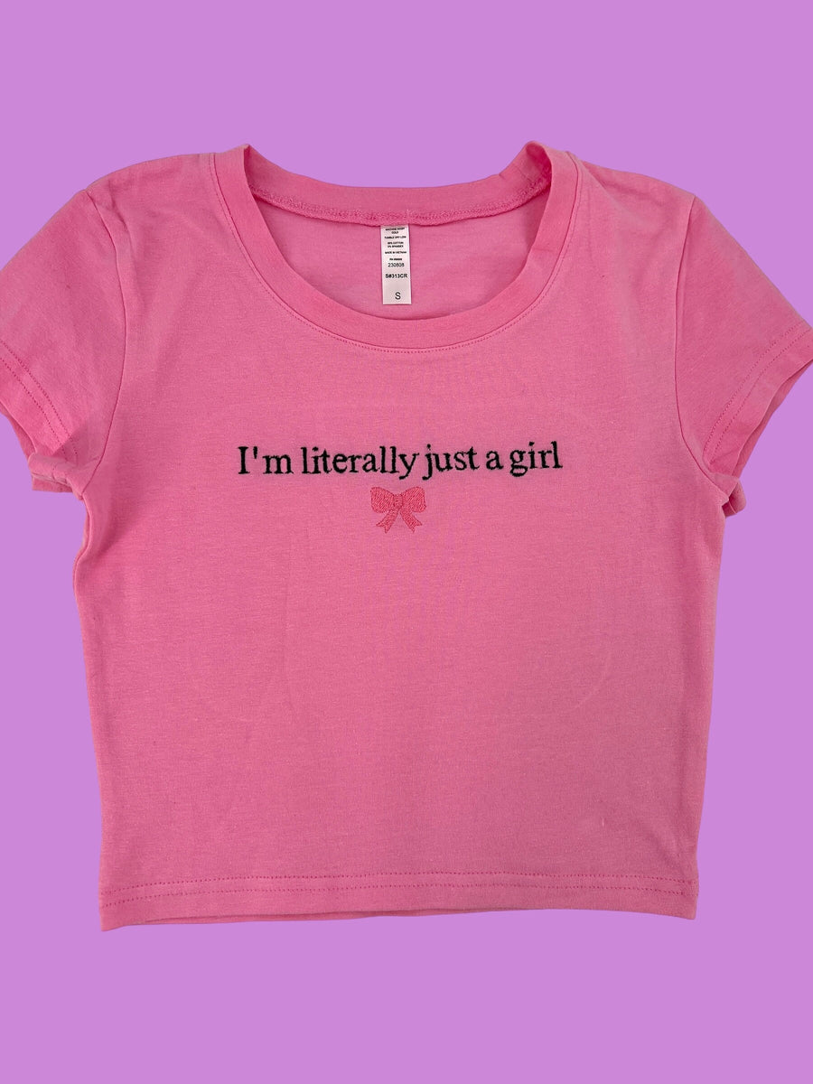 a pink shirt that says i&#39;m literally just a girl