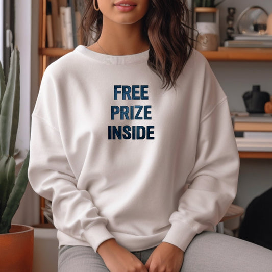 a woman sitting on a couch wearing a white sweatshirt with the words free prize inside