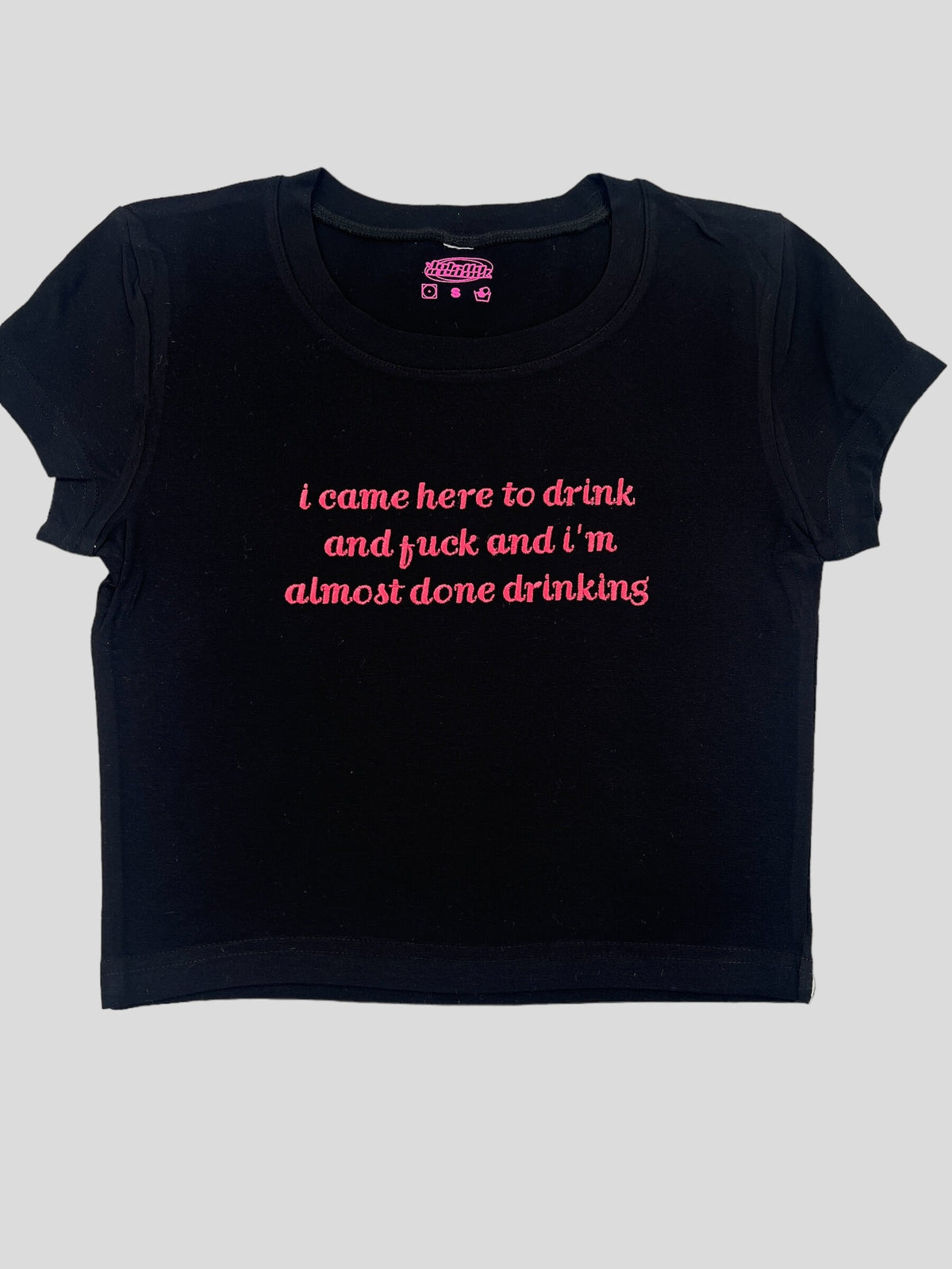 a black t - shirt with pink writing that says i came here to drink and