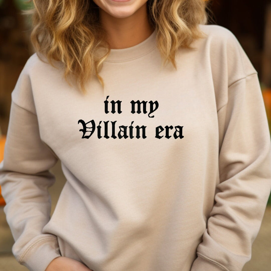 a woman wearing a sweatshirt that says i&#39;m my villain era