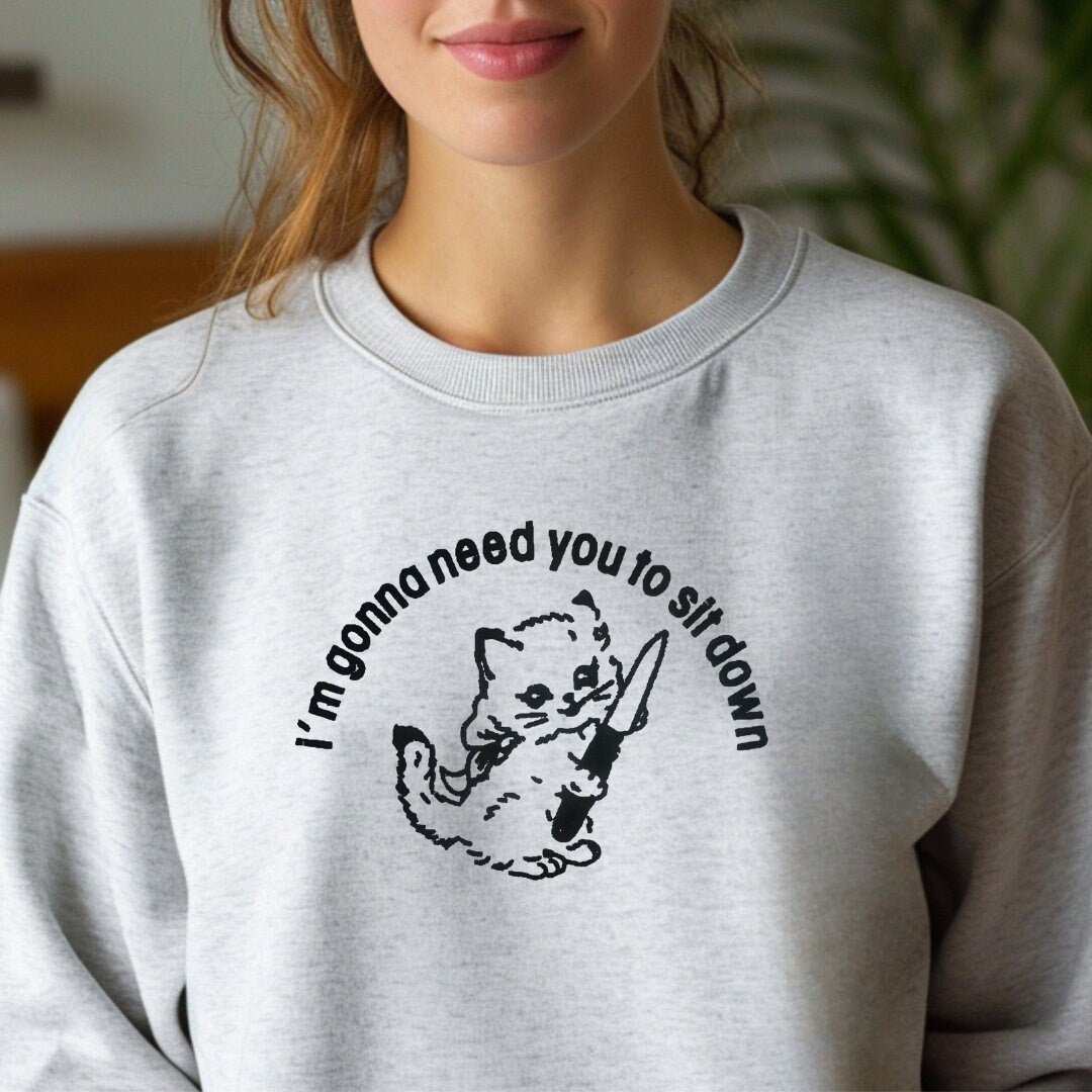 a woman wearing a sweatshirt that says i&#39;m someone need you to know