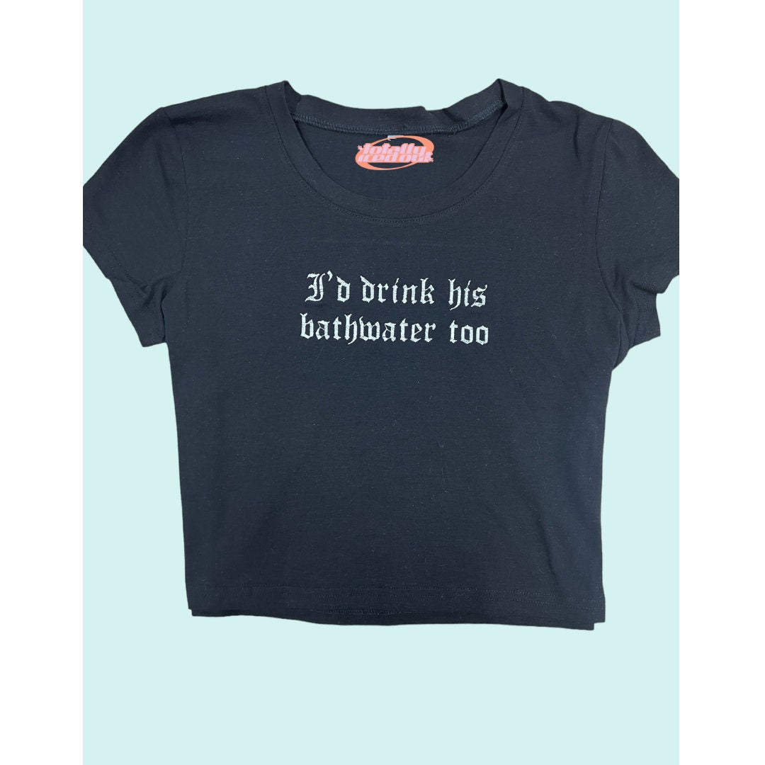 a black t - shirt that says to drink his bathwater too