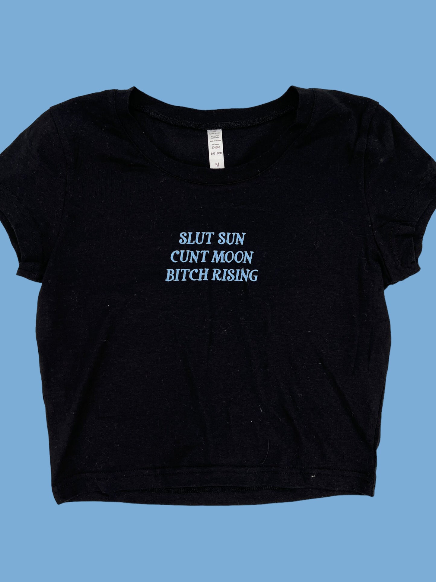 a black t - shirt that says slut sun, cunt moon, bitch