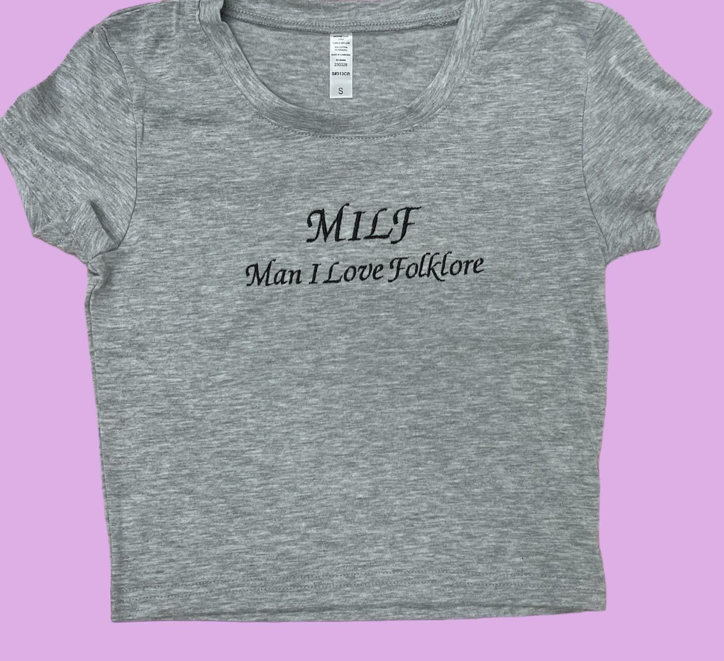 a women&#39;s t - shirt with the words milli man i love folklore