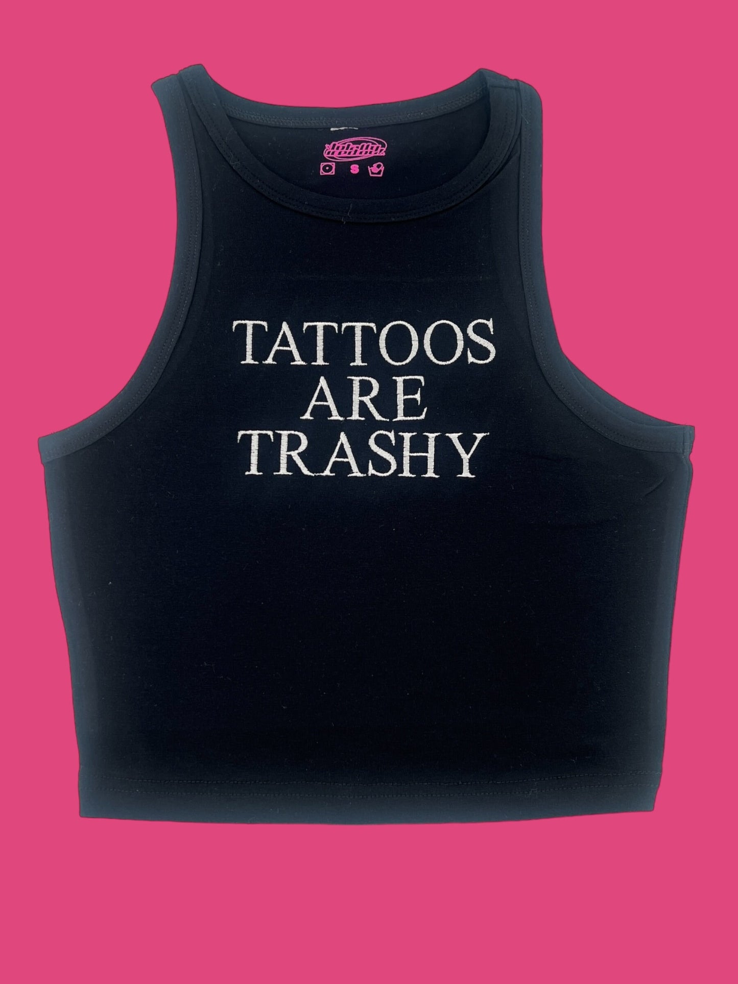 a black tank top that says tattoos are trashy